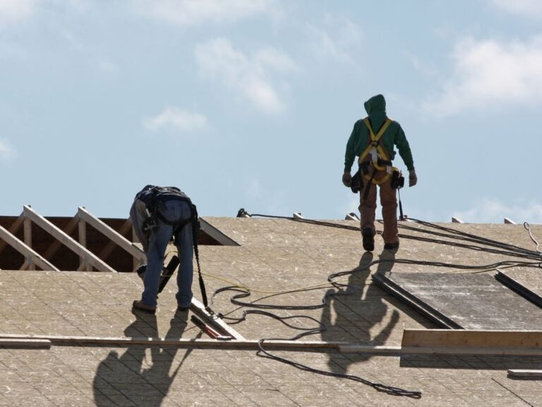 Summit Roofing working on a roof