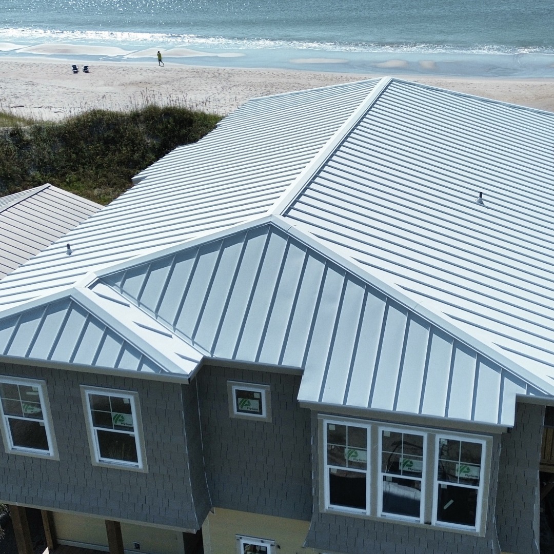 metal roof on a house next to a beach