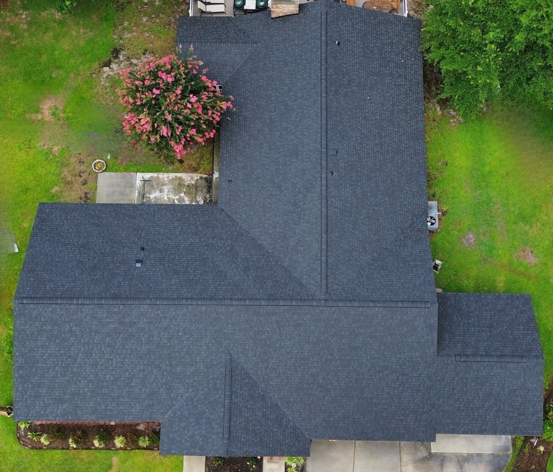 aerial view of a dark shingle roof