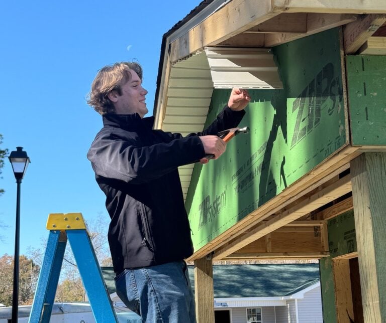 Summit Roofing team member working