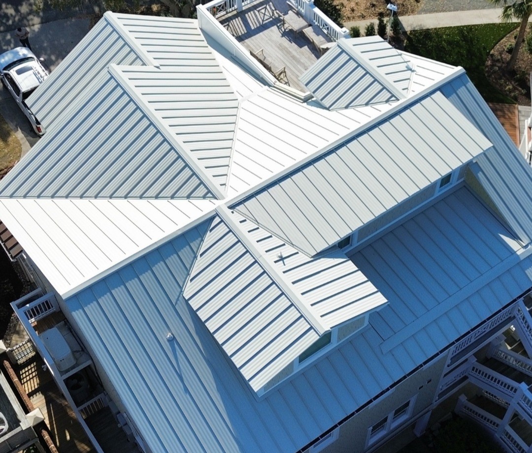 aerial view of a light grey metal roof