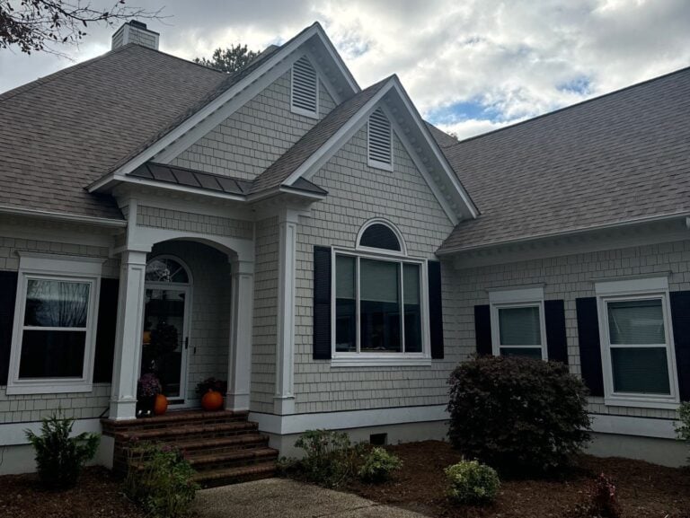 types of roof vents beige siding brown shingles