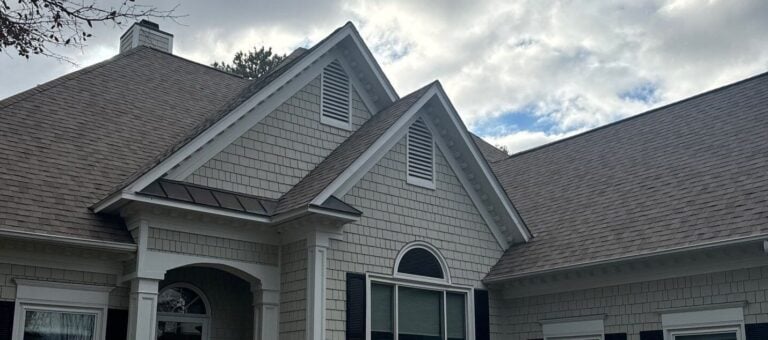 types of roof vents beige siding brown shingles