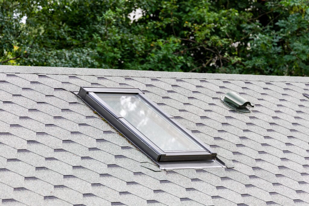 types of roof vents Window and ventilation system in roof of house. Selective focus.